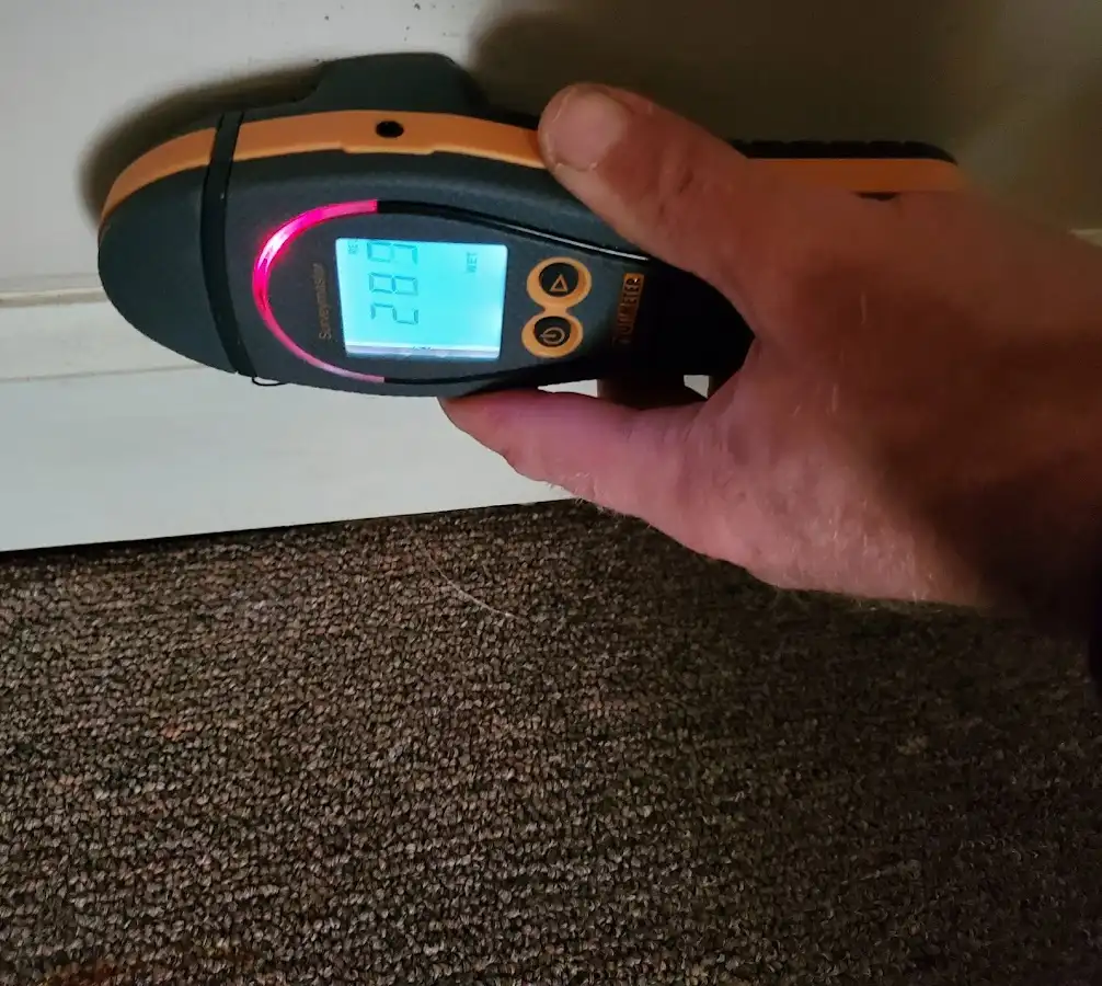 Moisture detection at baseboard during Mold Inspection & Testing in Destin
